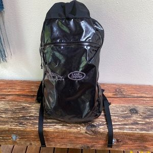 Waterproof Patagonia cinch top backpack.